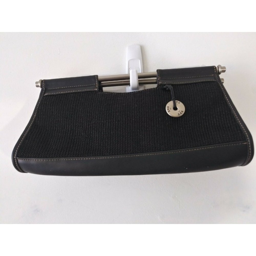 The Sak Clutch Purse Black with Metal Hardware Handle Purse Snap Closure